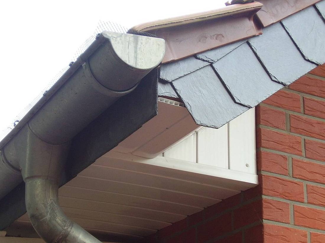 Clean guttering and fascia on a brick house